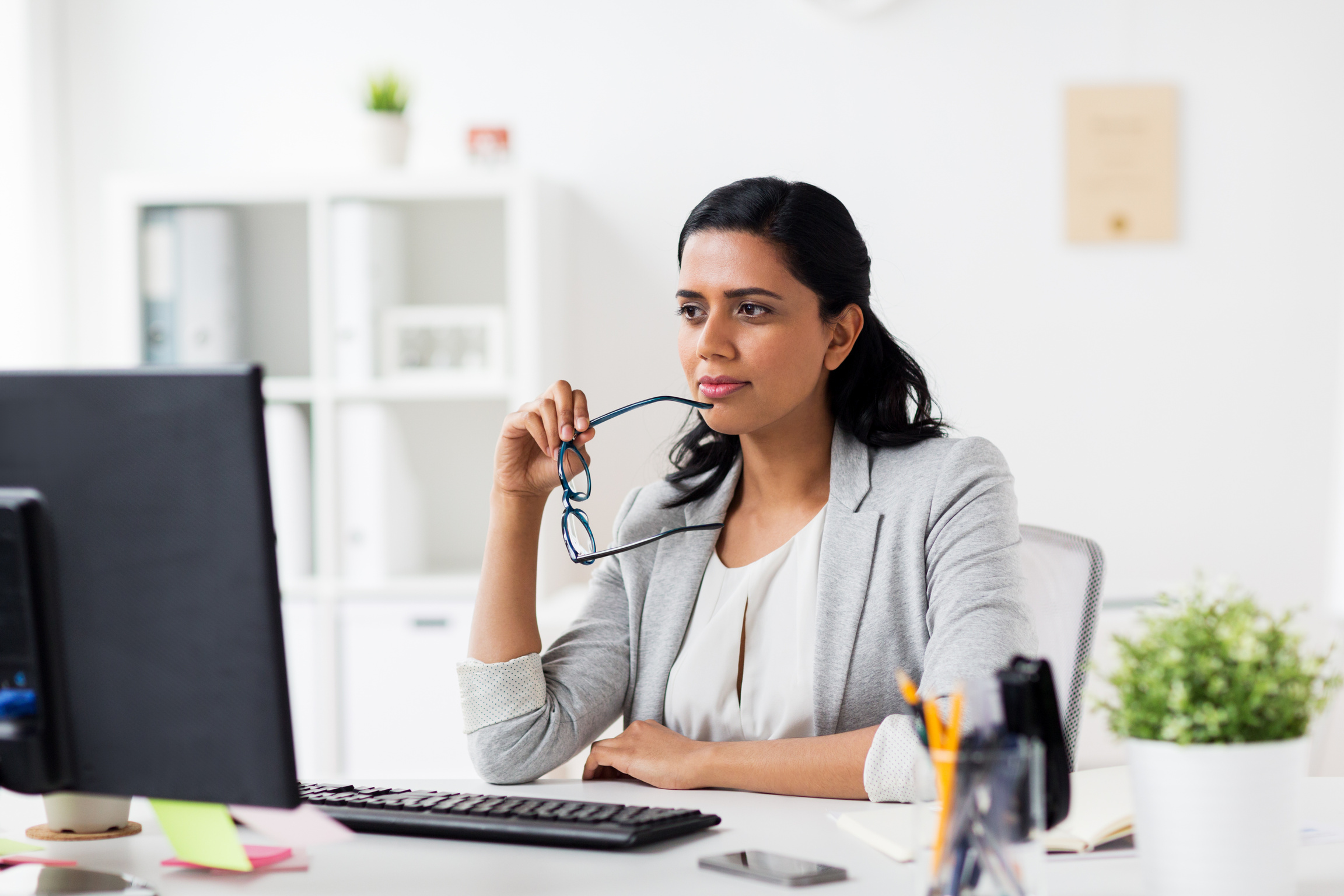 Employee at Her Work Desk 